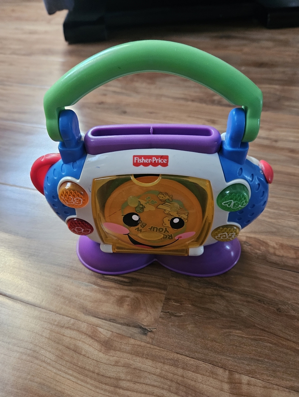 Fisher-Price Multicolor Musical Carry Toy with Green Handle And Disc Slot